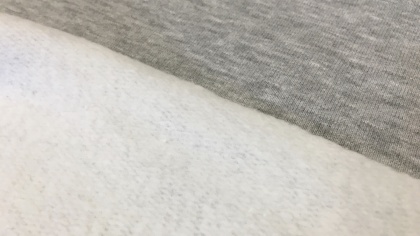 Gaiši pelēka melanžas siltinātā trikotāža – platā 2,2m (auduma gabals 50 cm)