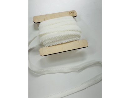 Piena balta aoakšveļas gumija ar cakiņu