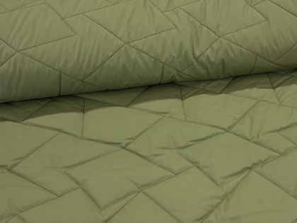 Zaļš stepēts virsdrtēbju audums